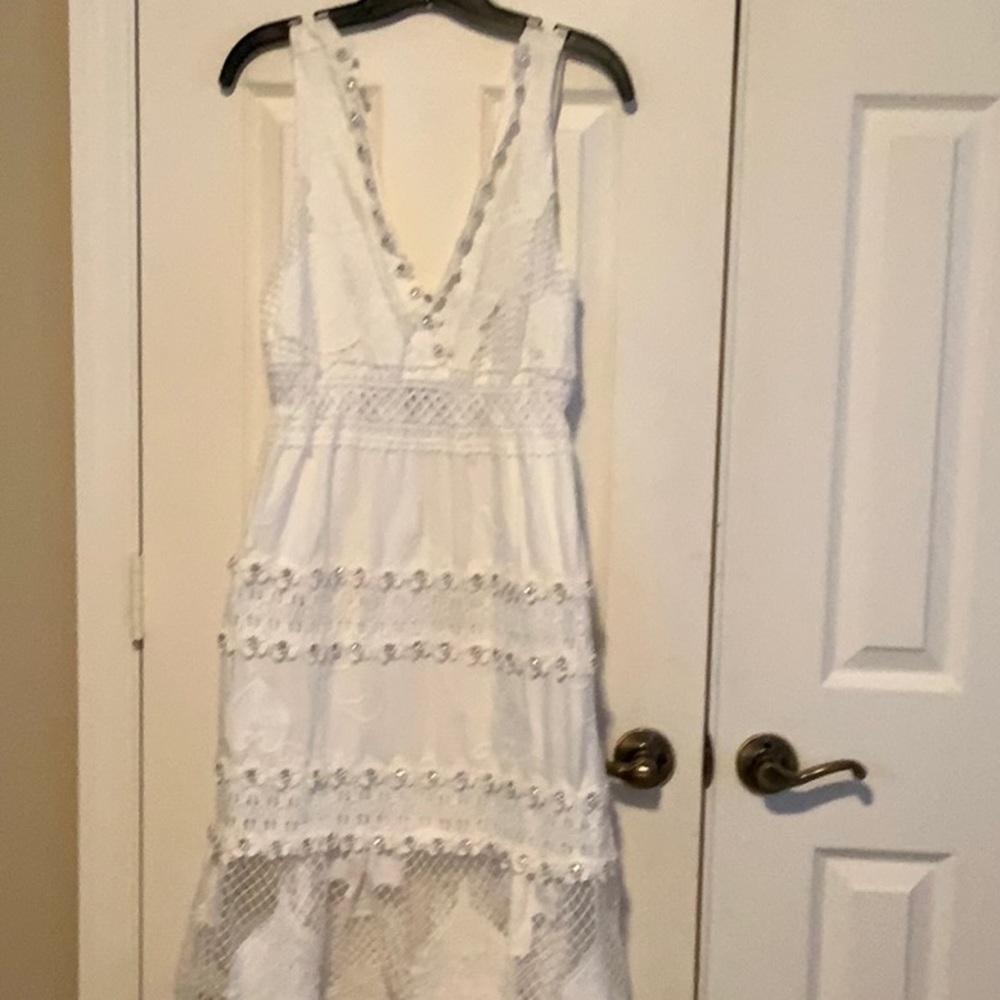 Beautiful sundress ..fancy never worn with tags.
